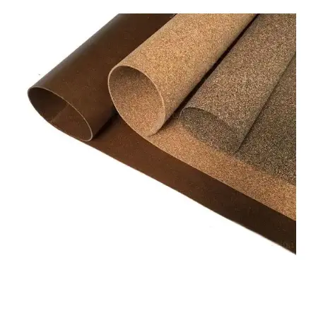 Slitting recycled rubber cork sheet Slitting recycled rubber cork sheet